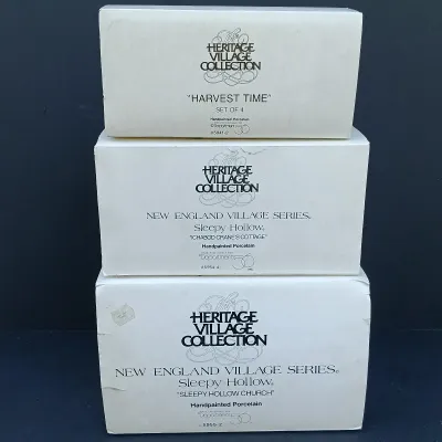LOT 127: Department 56 New England Series Sleepy Hollow Ichabod Crane's Cottage, Sleepy Hollow Church and Harvest Time