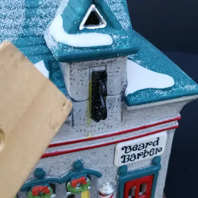 LOT 123: Department 56 North Pole Series Orly's Bell & Harness Supply, North Pole Express Depot and Beard Barber Shop