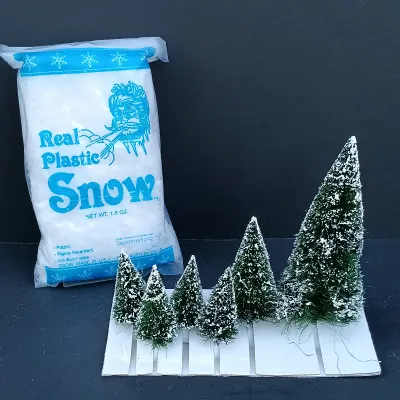 LOT 125: Department 56 North Pole Series Start a Tradition Set with Pencil Pines