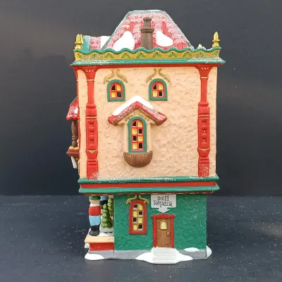 LOT 164: Department 56 North Pole Series Marie's Doll Museum and Jack In The Box Plant No. 2