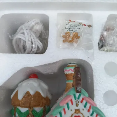 LOT 166: Department 56 North Pole Series Ginny's Cookie Treats Set, Christmas Fun Run and Have a Seat Elves