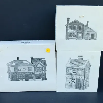 LOT 128: Department 56 Dickens Village Series The Old Curiosity Shop and Geo Weeton Watchmaker with New England Village Series Nathaniel...