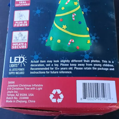 LOT 115: Inflatable 8ft Christmas Tree with Inflatable Gingerbread Men