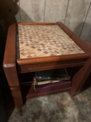 Mid-century modern wooden end table featuring a woven parquet-style top inlay and a lower storage shelf.