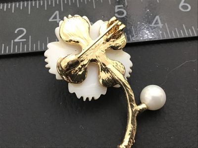 Vintage Carved White Flower Brooch with Green Cabochon and Faux Pearl