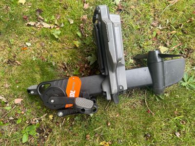 Old Town PDL Drive kayak pedal console, showing some wear from outdoor use.