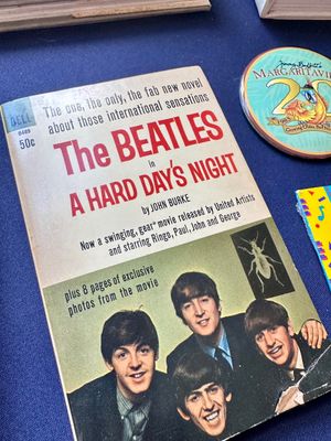 Vintage Dell paperback edition of "The Beatles in A Hard Day's Night" by John Burke, published in 1964, showing some wear...