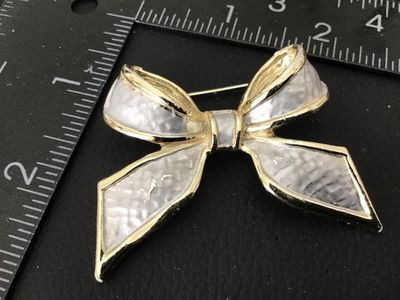 Vintage Gold Tone and White Enamel Bow Brooch