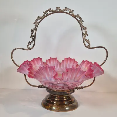 LOT 34: Victorian Bride's Basket with Cranberry Opalescent Poinsettia Glass on Silverplate Base