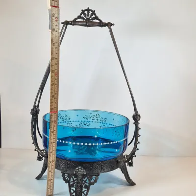 LOT 33: Antique Hand Painted Blue Glass Bowl on Ornate Silverplate Basket Stand from James W, Tufts