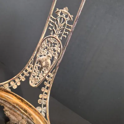 LOT 115: Antique Bride's Basket with Shell & Tassel Glass Bowl in Ornate Pickle Castor Style Basket with Sterling Silver Fork