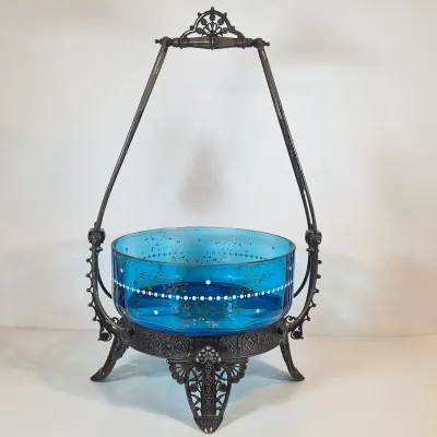 LOT 33: Antique Hand Painted Blue Glass Bowl on Ornate Silverplate Basket Stand from James W, Tufts