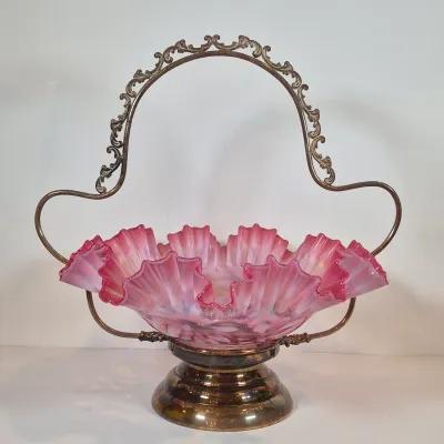 LOT 34: Victorian Bride's Basket with Cranberry Opalescent Poinsettia Glass on Silverplate Base