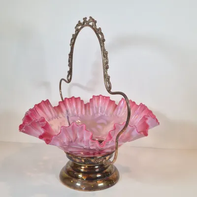 LOT 34: Victorian Bride's Basket with Cranberry Opalescent Poinsettia Glass on Silverplate Base