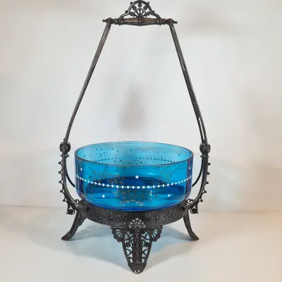 LOT 33: Antique Hand Painted Blue Glass Bowl on Ornate Silverplate Basket Stand from James W, Tufts