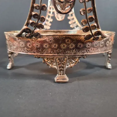 LOT 115: Antique Bride's Basket with Shell & Tassel Glass Bowl in Ornate Pickle Castor Style Basket with Sterling Silver Fork