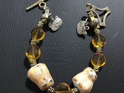 Whimsical porcelain Cat and Amber Glass Bead Toggle Bracelet. Vintage