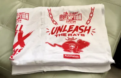 Florida Panthers 2024 playoff rally towel featuring "Unleash the Rats" graphics and AutoNation sponsorship.
