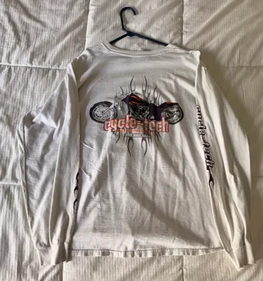 Vintage Cycle-Tech long-sleeve graphic t-shirt in off-white, featuring a motorcycle and flame design on the back and sleeves.