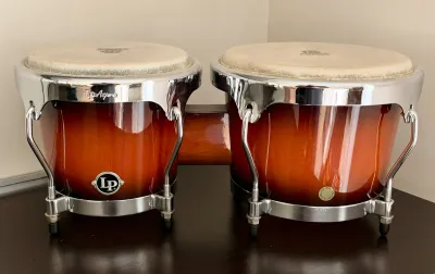 Latin Percussion Aspire series bongo drums featuring a glossy sunburst finish wood shell and chrome hardware.