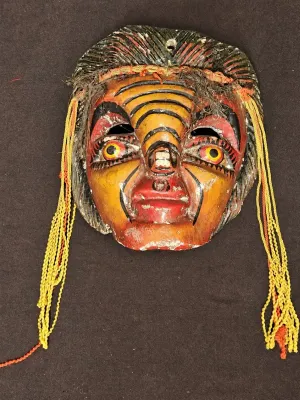 HAND-CARVED WOODEN FOLK ART MASK
