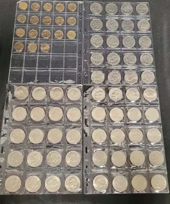 SEVENTY-EIGHT EISENHOWER AND SACAGAWEA DOLLAR COINS