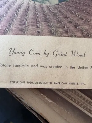 Sale Photo Thumbnail #169: An authentic vintage Gelatone facsimile print of Grant Wood's famous 1931 painting "Young Corn". Published by Associated American Artists, Inc. with a copyright date of 1950. Created in the United States of America. The print features the original paintin
