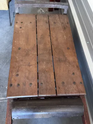 Sale Photo Thumbnail #14: An authentic antique Fairbanks wooden hand truck scale, combining a heavy-duty warehouse dolly with an integrated mechanical platform scale. Features a sturdy wood-plank bed, curved wooden handles, cast iron wheels, and the original mechanical weighing me