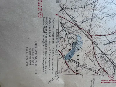 Sale Photo Thumbnail #206: A collection of vintage United States Geological Survey (USGS) topographic maps of Maine. Includes the Dover-Foxcroft, ME quadrangle (Edition of 1935, reprinted 1947) and the Berwick, ME-NH quadrangle (Edition of 1944, reprinted 1948). These maps feature 
