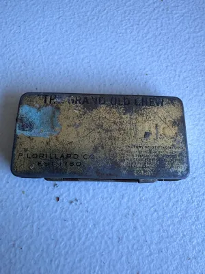 Sale Photo Thumbnail #200: An antique/vintage pocket-sized metal tobacco tin for Climax Plug tobacco, manufactured by the P. Lorillard Co. (Est. 1760) in the United States (Factory No. 10, Fifth District, N.J.). The lid features the red "CLIMAX PLUG" logo on a gold and brown stripe