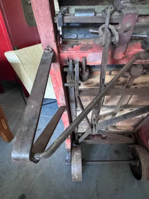Sale Photo Thumbnail #18: An authentic antique Fairbanks wooden hand truck scale, combining a heavy-duty warehouse dolly with an integrated mechanical platform scale. Features a sturdy wood-plank bed, curved wooden handles, cast iron wheels, and the original mechanical weighing me