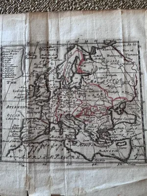 Sale Photo Thumbnail #100: An antique copperplate engraved map titled 'Europe' by the notable English cartographer Robert Morden (c. 1650–1703). This miniature map features hand-colored outlines in red/pink, showing the European continent, parts of North Africa, and 'Moscovia' (R