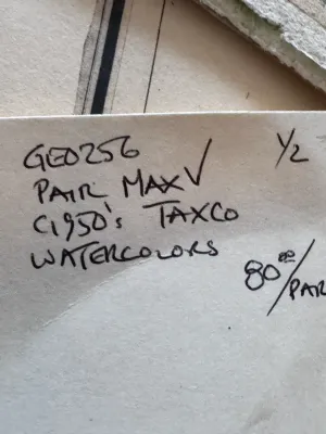 Sale Photo Thumbnail #216: A beautiful pair of original mid-century watercolor paintings depicting vibrant street scenes of Taxco, Mexico. Each piece is signed by the artist 'Max V.' in the lower corner. One painting features a cobblestone street leading toward the iconic Santa Pri