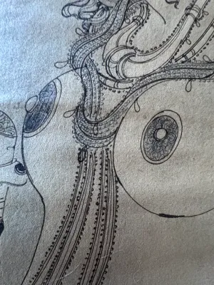 Sale Photo Thumbnail #149: A vintage Indian ink drawing on textured paper depicting a stylized female figure adorned with traditional jewelry, reminiscent of classical Indian temple carvings or Ajanta cave paintings. The piece features intricate line work detailing her necklaces, a