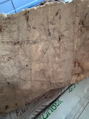 Sale Photo Thumbnail #132: A vintage Pacific Island tapa cloth (siapo / masi), handcrafted from the inner bark of the paper mulberry tree. Features traditional hand-painted geometric patterns, star motifs, and leaf designs in natural brown and black pigments. Shows authentic textur