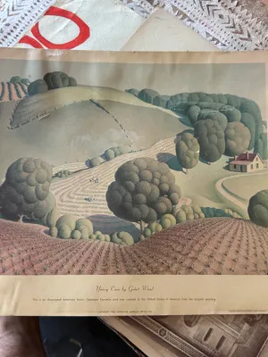 Sale Photo Thumbnail #168: An authentic vintage Gelatone facsimile print of Grant Wood's famous 1931 painting "Young Corn". Published by Associated American Artists, Inc. with a copyright date of 1950. Created in the United States of America. The print features the original paintin
