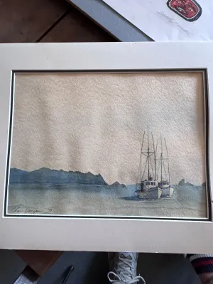Sale Photo Thumbnail #220: An original watercolor painting on textured paper depicting two boats on the water with mountains in the background. Signed by the artist 'Chris Dreyer' and dated '79 in the lower left corner. The piece is presented in a white and black double mat. Good v