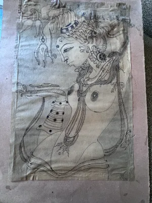 Sale Photo Thumbnail #148: A vintage Indian ink drawing on textured paper depicting a stylized female figure adorned with traditional jewelry, reminiscent of classical Indian temple carvings or Ajanta cave paintings. The piece features intricate line work detailing her necklaces, a