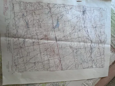 Sale Photo Thumbnail #207: A collection of vintage United States Geological Survey (USGS) topographic maps of Maine. Includes the Dover-Foxcroft, ME quadrangle (Edition of 1935, reprinted 1947) and the Berwick, ME-NH quadrangle (Edition of 1944, reprinted 1948). These maps feature 