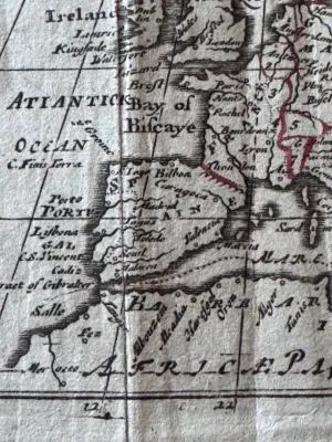 Sale Photo Thumbnail #102: An antique copperplate engraved map titled 'Europe' by the notable English cartographer Robert Morden (c. 1650–1703). This miniature map features hand-colored outlines in red/pink, showing the European continent, parts of North Africa, and 'Moscovia' (R