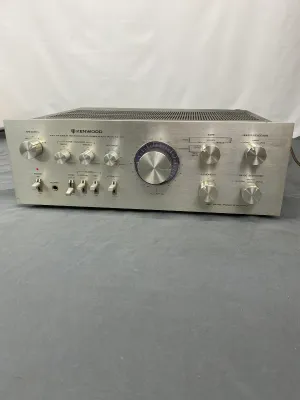 Vintage Kenwood KA-7300 stereo integrated amplifier featuring a brushed aluminum faceplate and dual power supply, circa late 1970s.