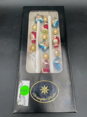 Christopher Radko glass Christmas taper candles featuring colorful, hand-painted festive ornaments, presented in their original black...