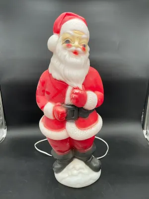 Vintage mid-century molded plastic Santa Claus blow mold light, showing some paint wear consistent with age.