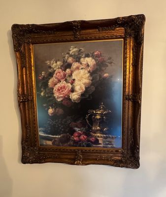 Sale Photo Thumbnail #12: Framed still life print depicting a lush bouquet of roses, fruit, and an ornate metal vessel, housed in a heavy, ornate gold-gilded frame.