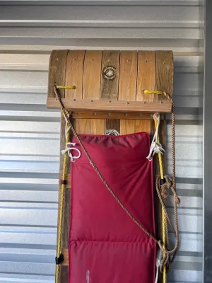 Vintage Adirondack Industries Wooden Toboggan Sled with Red Cushion
