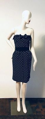 Vintage NINA RICCI Strapless blue and white polka dot dress with a sweetheart neckline, bow detail, and a solid black waistband. Perfect...