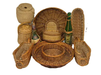 Collection of vintage woven wicker baskets, trays, and bottle holders, including a large round tray, lidded canisters, and decorative...