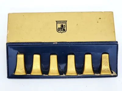 Vintage Pickard China gold-plated individual salt and pepper shaker set of six, presented in its original blue and gold box.