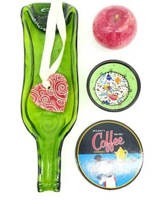 Assorted decorative items including a slumped green glass wine bottle tray with a ceramic heart ornament, a small hand-painted Turkish...