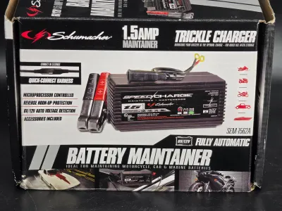 Schumacher 1.5 Amp SpeedCharge battery maintainer and trickle charger, model SEM-1562A, in its original retail box.